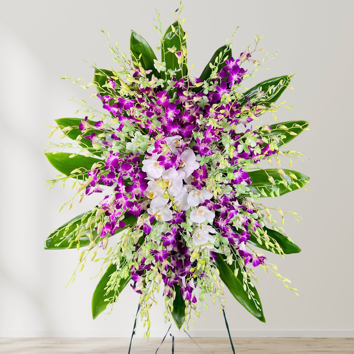 infinite orchid - sympathy standing spray