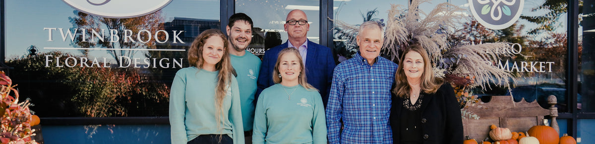 Twinbrook team in front of Chantilly storefront
